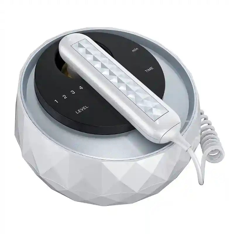 White, spherical anti-aging device with a textured, diamond-patterned base and a sleek, diamond-embossed wand on top.