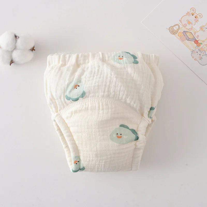 Soft muslin baby training diaper with cute cartoon fish print, perfect for gentle baby care and potty training.