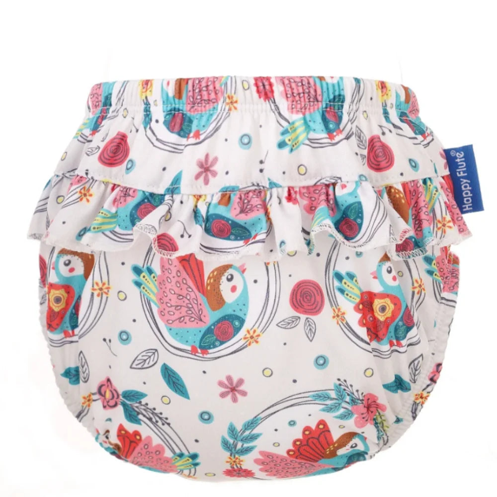 Happy Flute reusable baby diaper cover with ruffled trim and colorful bird floral print pattern.