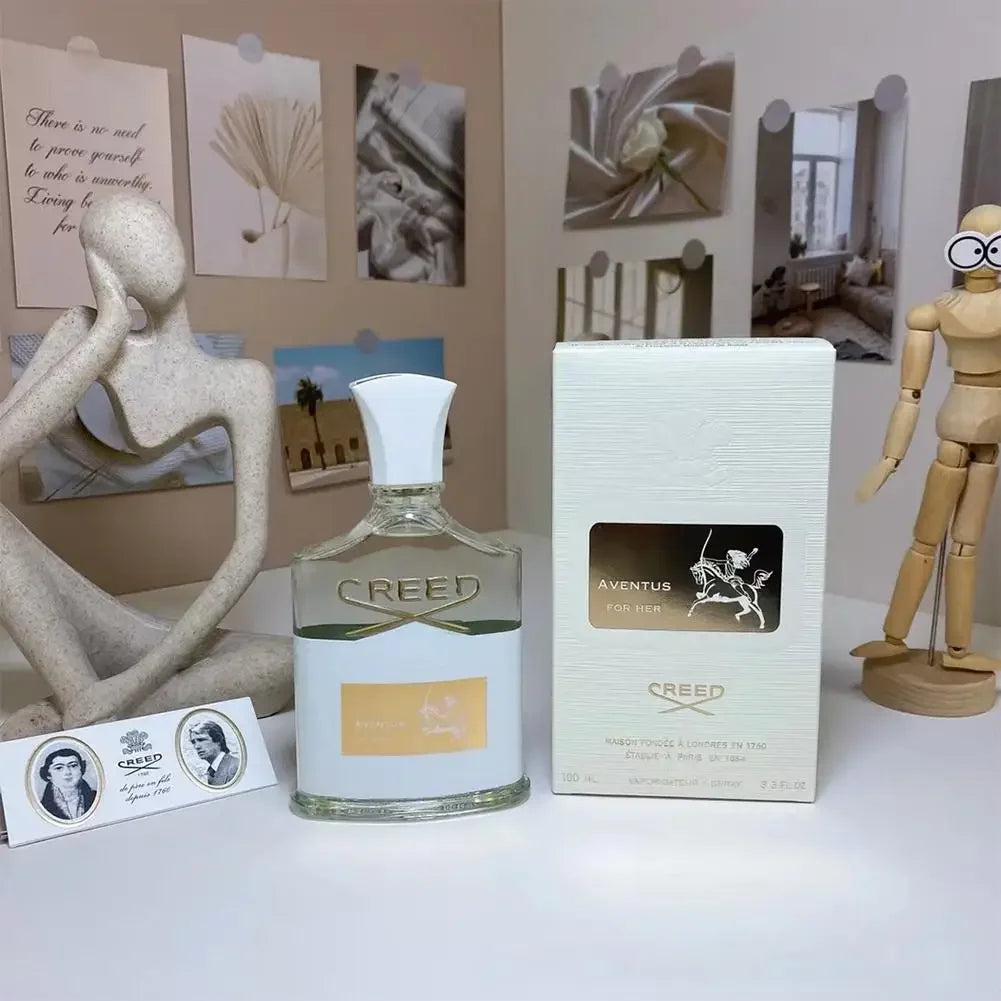 Creed Aventus for Her EDP: Iconic white signature bottle, floral-fruity scent spray, luxury women’s perfume by Creed.