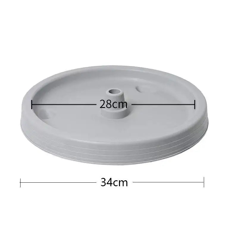 Grey plastic planter base lid, 34cm diameter, with center watering hole
