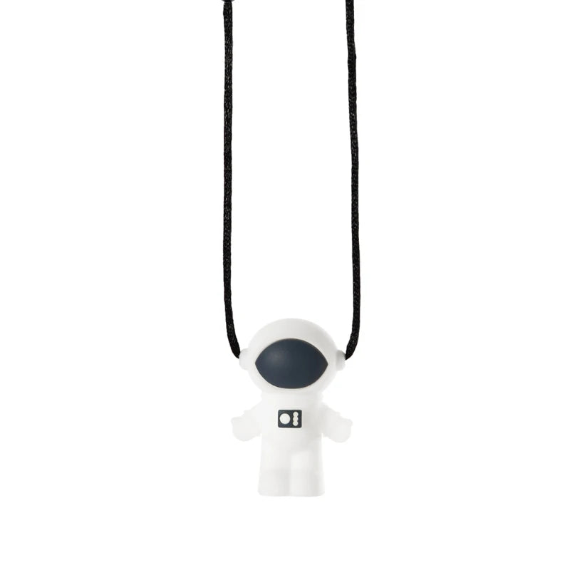 White silicone astronaut baby teething toy on black cord for soothing relief.