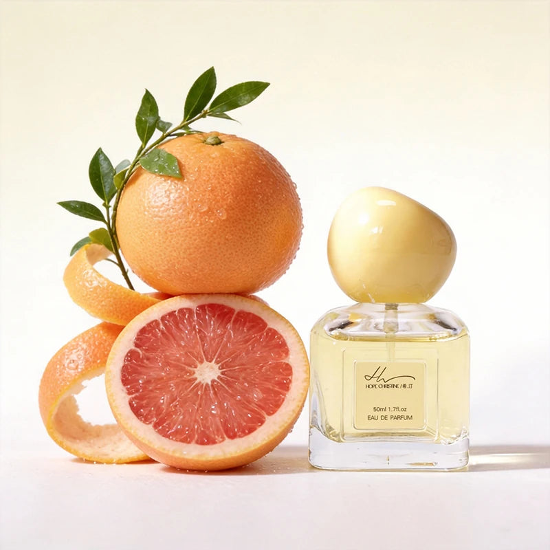 Hope Christine Pomelo EDP for women: 50ml fresh citrus fragrance in a square glass bottle with a round yellow cap.
