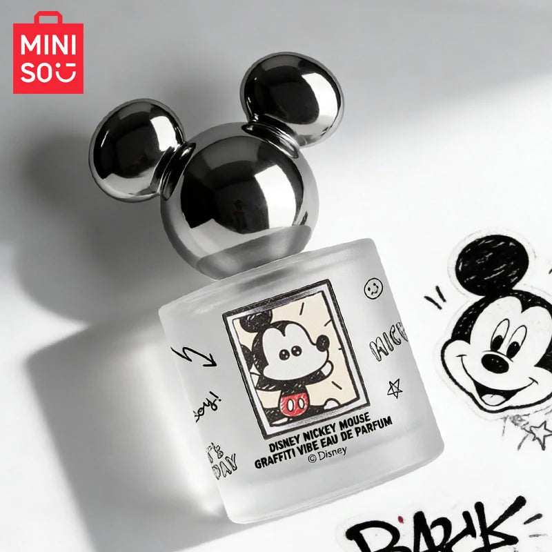 MINISO Disney Mickey Mouse Graffiti Vibe EDP: Floral perfume for women in a frosted 50ml bottle with Mickey-ear cap.