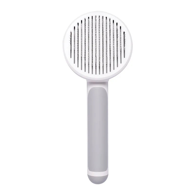 Self-cleaning white and grey pet slicker brush for dogs and cats to easily remove loose fur and detangle hair.