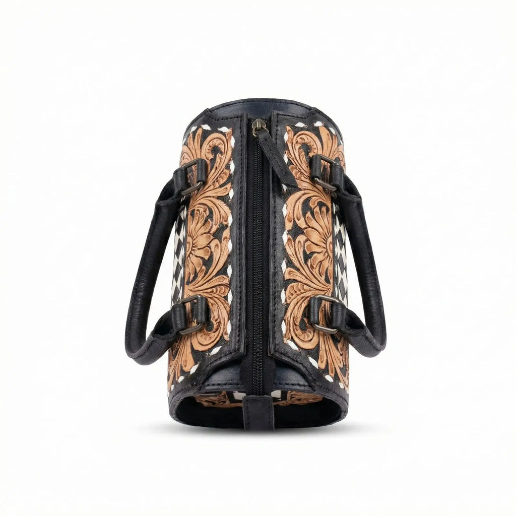 Luxury hand-tooled floral leather weekender bag with black checkered patterns and sturdy carry handles.