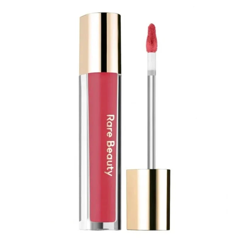 Rare Beauty Soft Pinch Tinted Lip Oil with doe-foot applicator in a vibrant pink gloss stain.