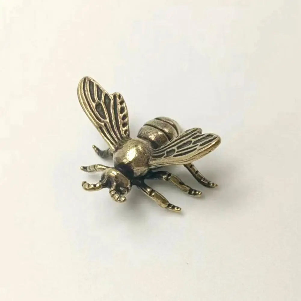 Solid brass bee figurine tea pet, a realistic golden metal insect sculpture perfect for desktop home decor.