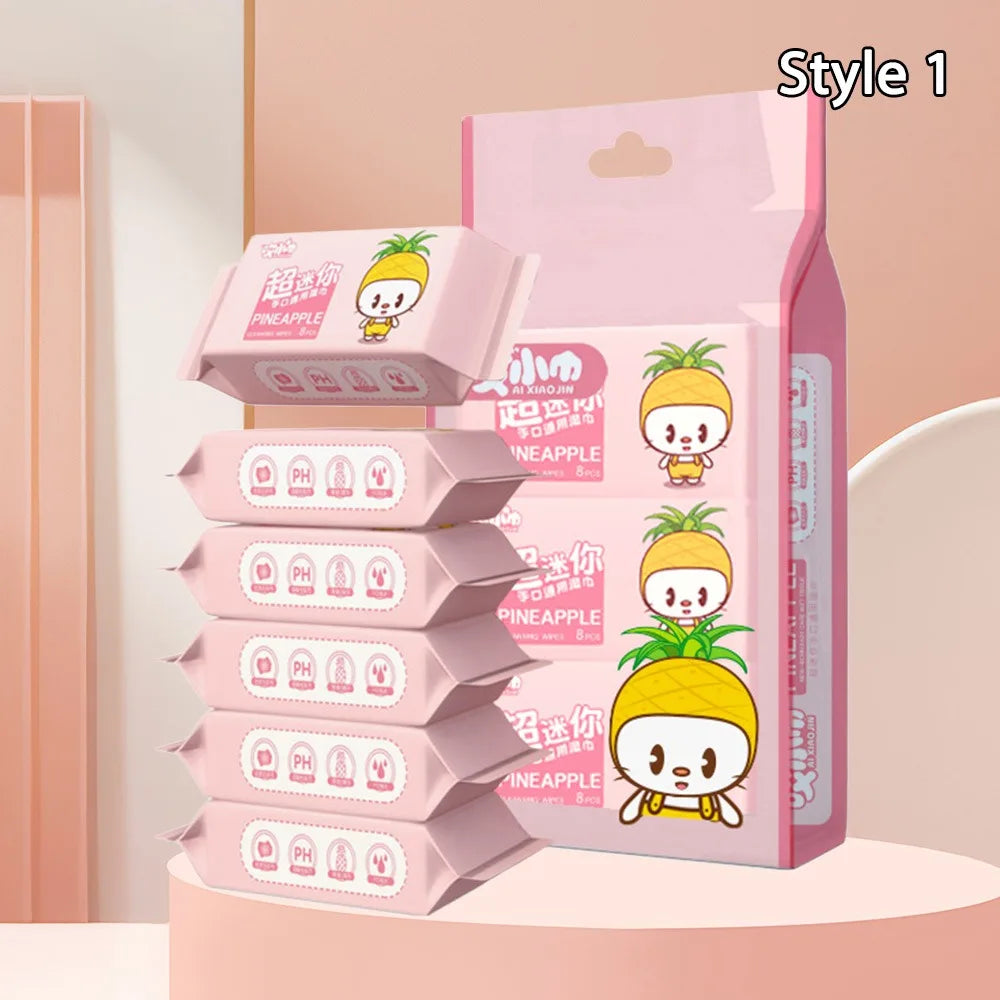 Ai Xiaojin baby care wipes, 8-count travel packs with cute pineapple character design, pink packaging.
