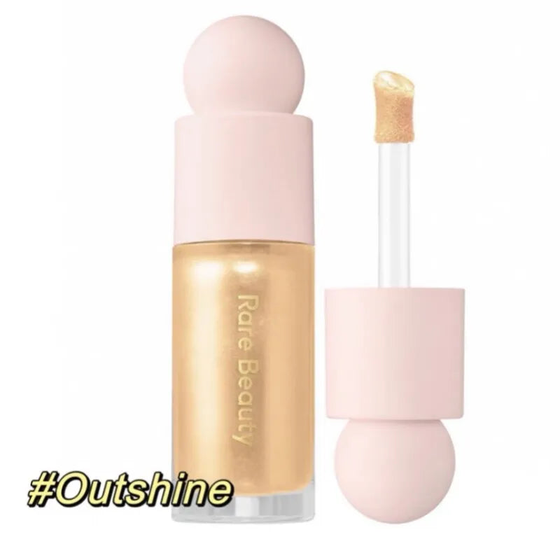 Rare Beauty Positive Light Liquid Luminizer in a gold, silky metallic formula with an applicator wand.