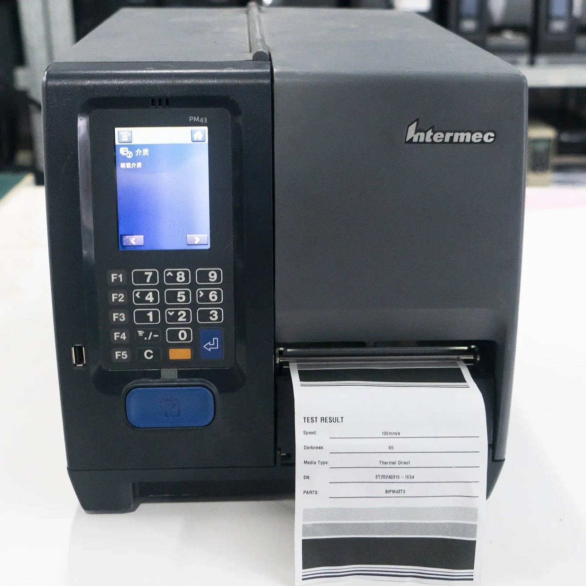Intermec label printer with thermal printhead and printed test label