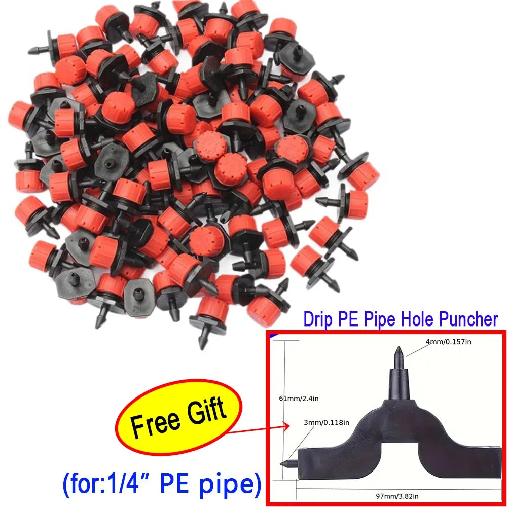 Bulk orange-and-black drip emitters with small nozzle outlets for tubing