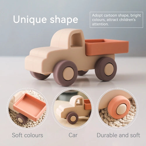 Beige, orange, and brown silicone truck baby teething toy for soothing sore gums.