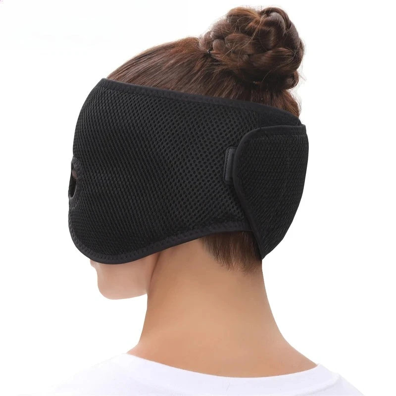 Black, mesh-textured heating half-face mask secured with side straps on a person's head.