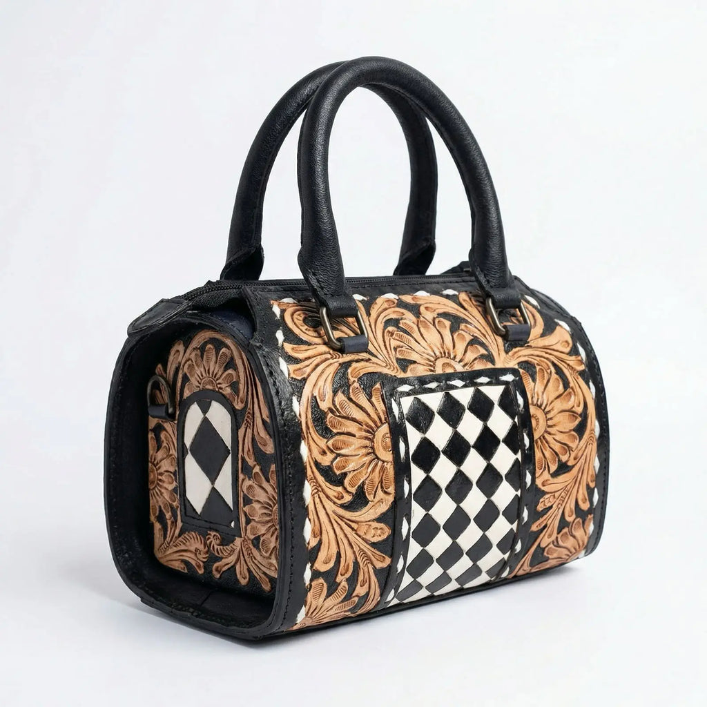 Hand-tooled genuine leather travel duffel bag with black and tan floral carvings and a checkered pattern.