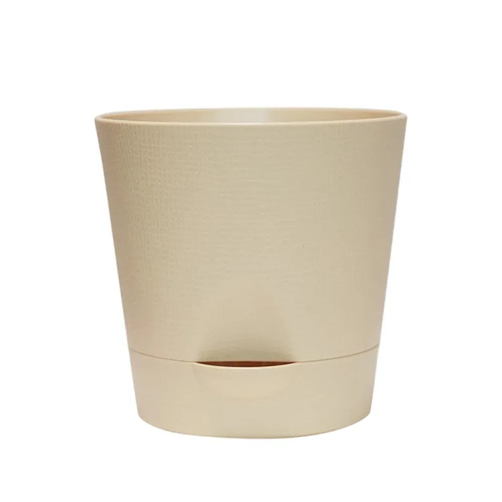 Beige round plastic self-watering flower pot with detachable bottom base and drainage opening