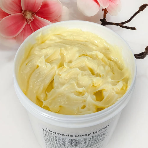 Anti-inflammatory turmeric body lotion in a white 1000g jar.