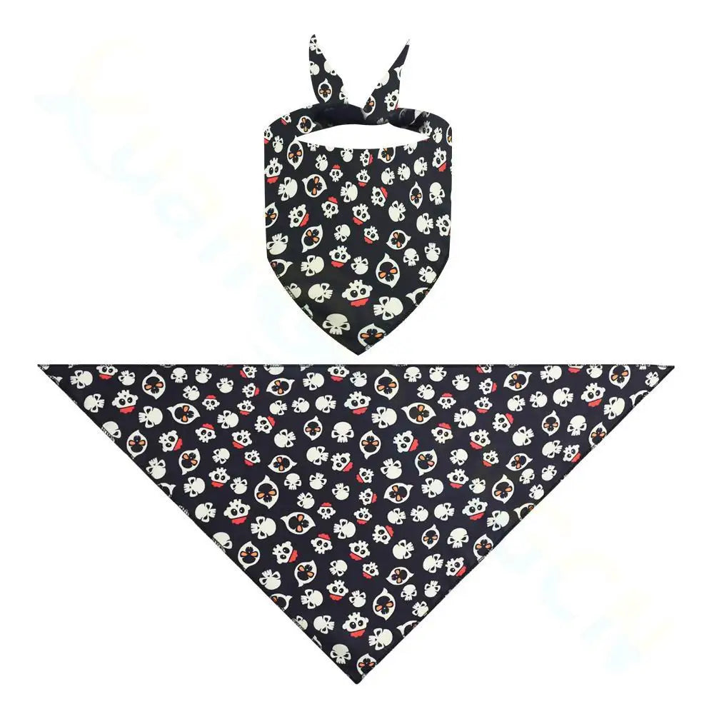 Black skull print triangle bandana for dogs and cats. Perfect Halloween pet costume accessory for spooky dress-up.
