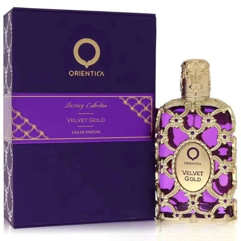 Orientica Velvet Gold Eau de Parfum: 100ml luxurious floral-scented fragrance in an ornate, gold-caged purple bottle.