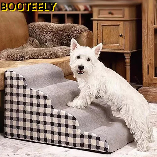 Dog using grey memory foam pet stairs for sofa. Anti-slip, washable, stable dog ladder for easy furniture access.