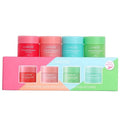 Laneige Lip Sleeping Mask Mini Kit featuring four colorful, moisturizing scented lip care balms in travel-sized jars.