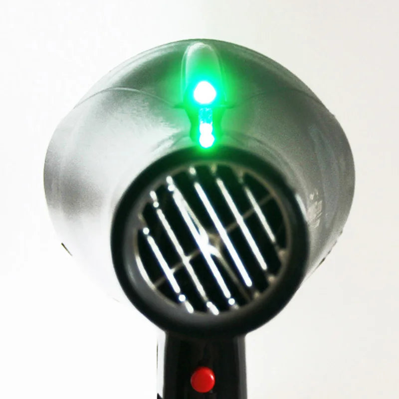 Professional 2100W hair dryer in matte black with green LED indicator and circular air intake, salon-quality tool.