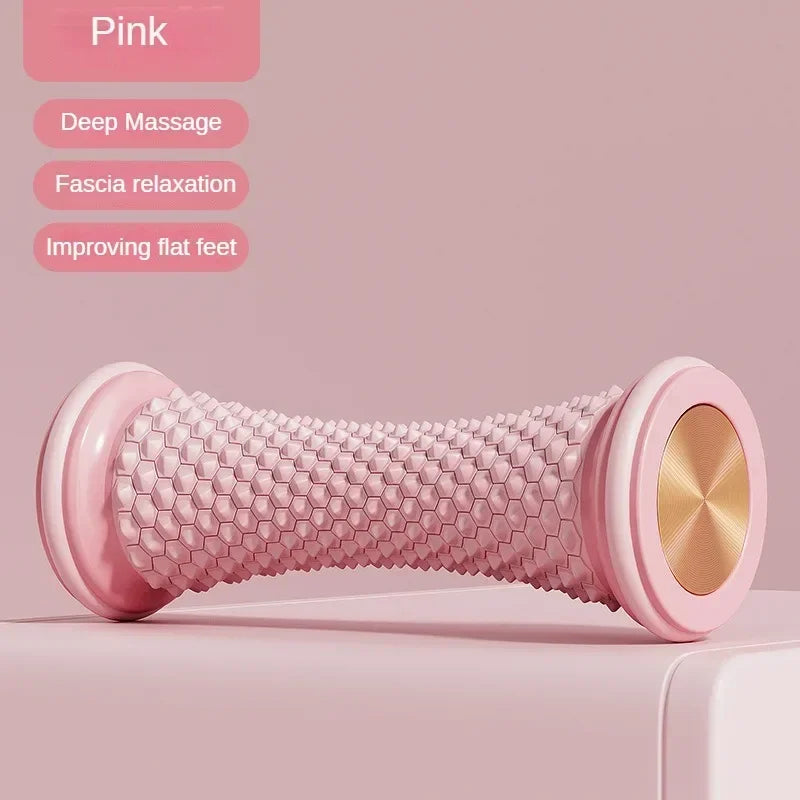 Pink manual foot massage roller with textured surface for plantar fasciitis, muscle relief, and yoga relaxation.