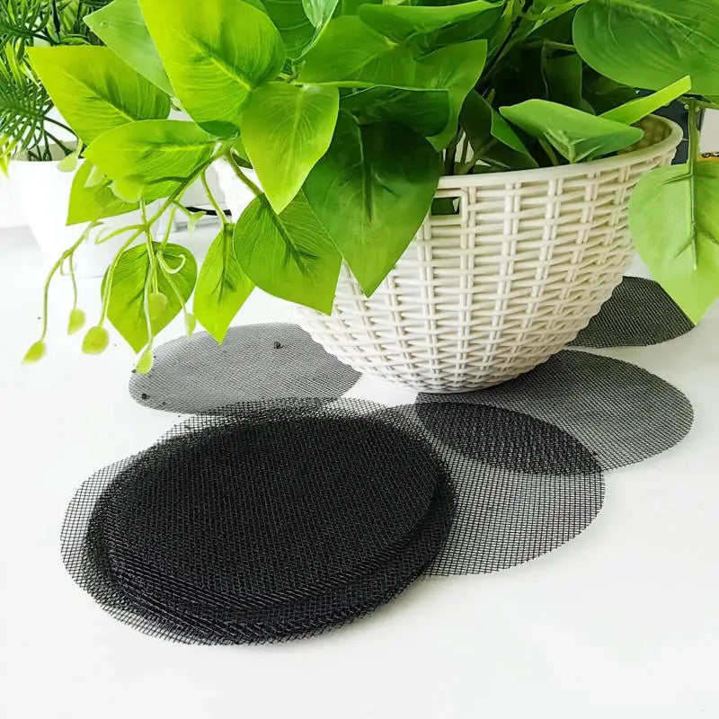 Round black mesh pot drainage mat, grid design with circular anti-soil-loss screen