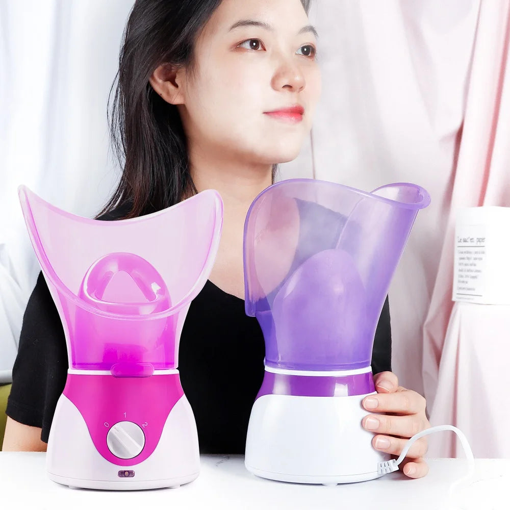 Woman using purple and pink portable home facial steamers for deep pore cleansing, skin moisturizing, and SPA care.