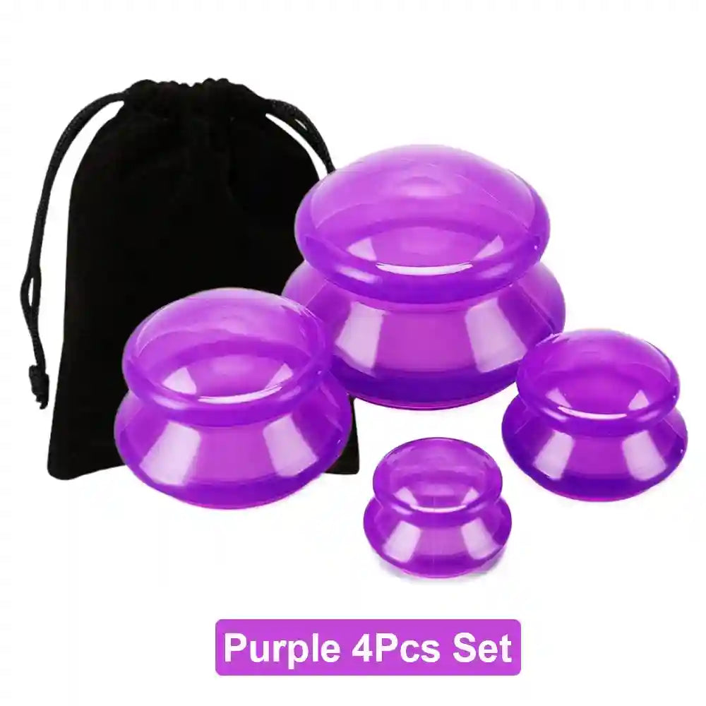 Four purple silicone suction massage cups in varying sizes arranged with a black drawstring storage bag.