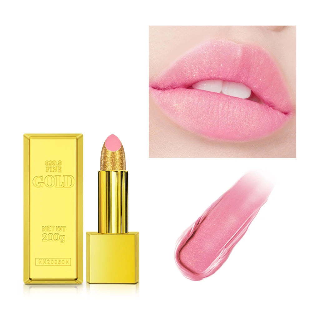 Gold brick tube lipstick with shimmering pink glitter finish, waterproof long-lasting formula, and creamy texture swatch.