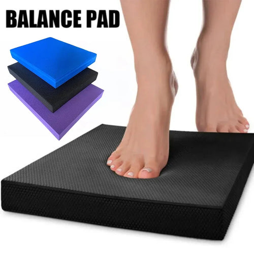 Soft balance pad for fitness, non-slip foam exercise cushion for smart yoga mats, person standing on black foam pad.