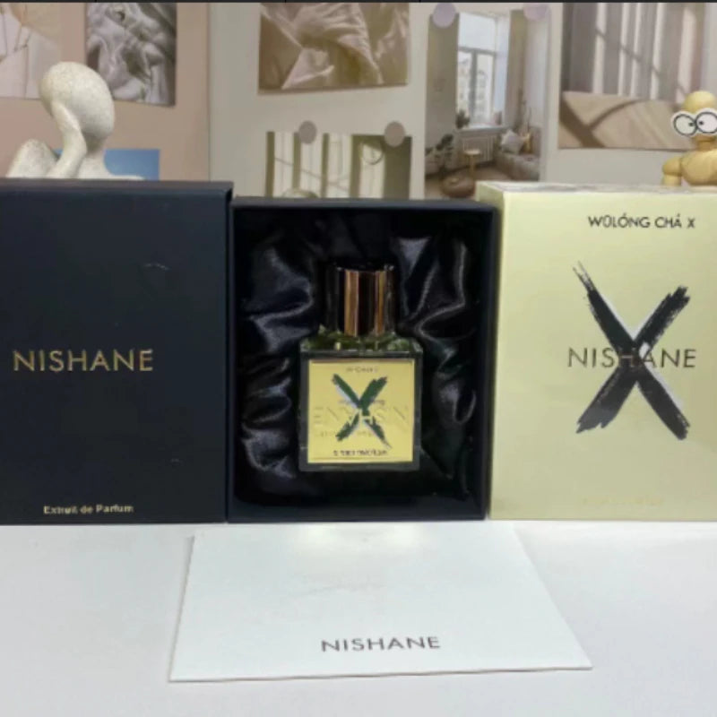 Nishane Wulong Cha X Extrait de Parfum for men: 100ml square bottle with gold label in elegant black gift box set.