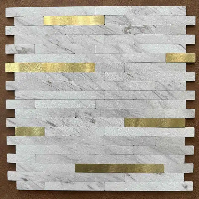 White/gray marble-look peel-and-stick mosaic tiles with gold metal stripes