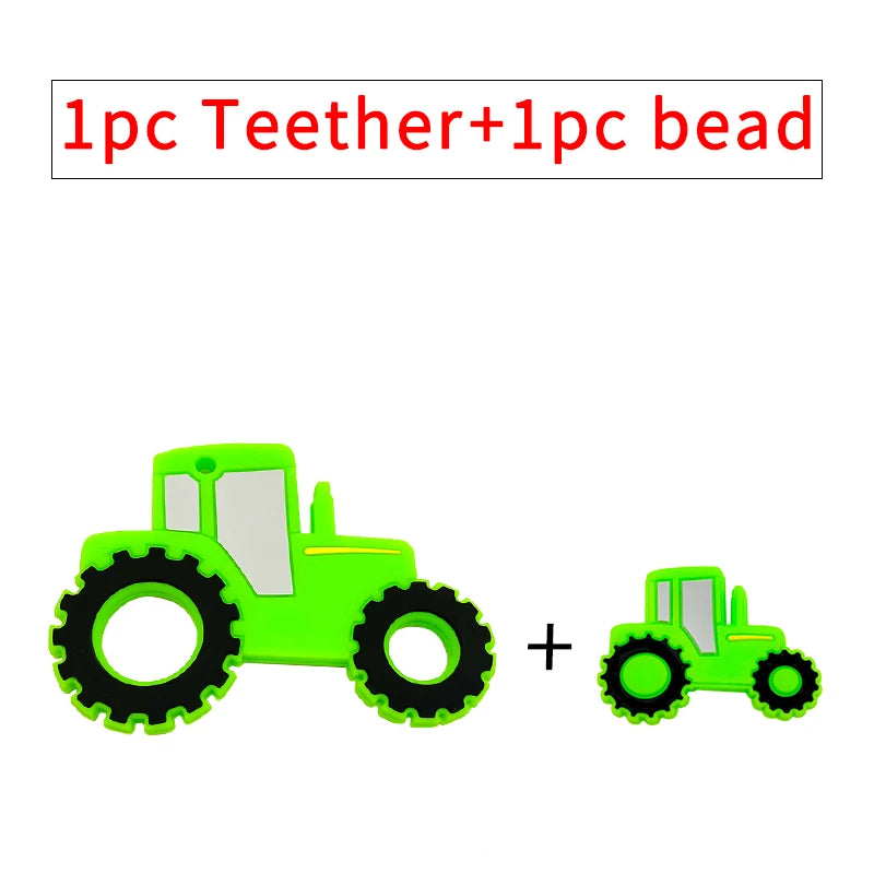 Green tractor silicone baby teething toy for relief.