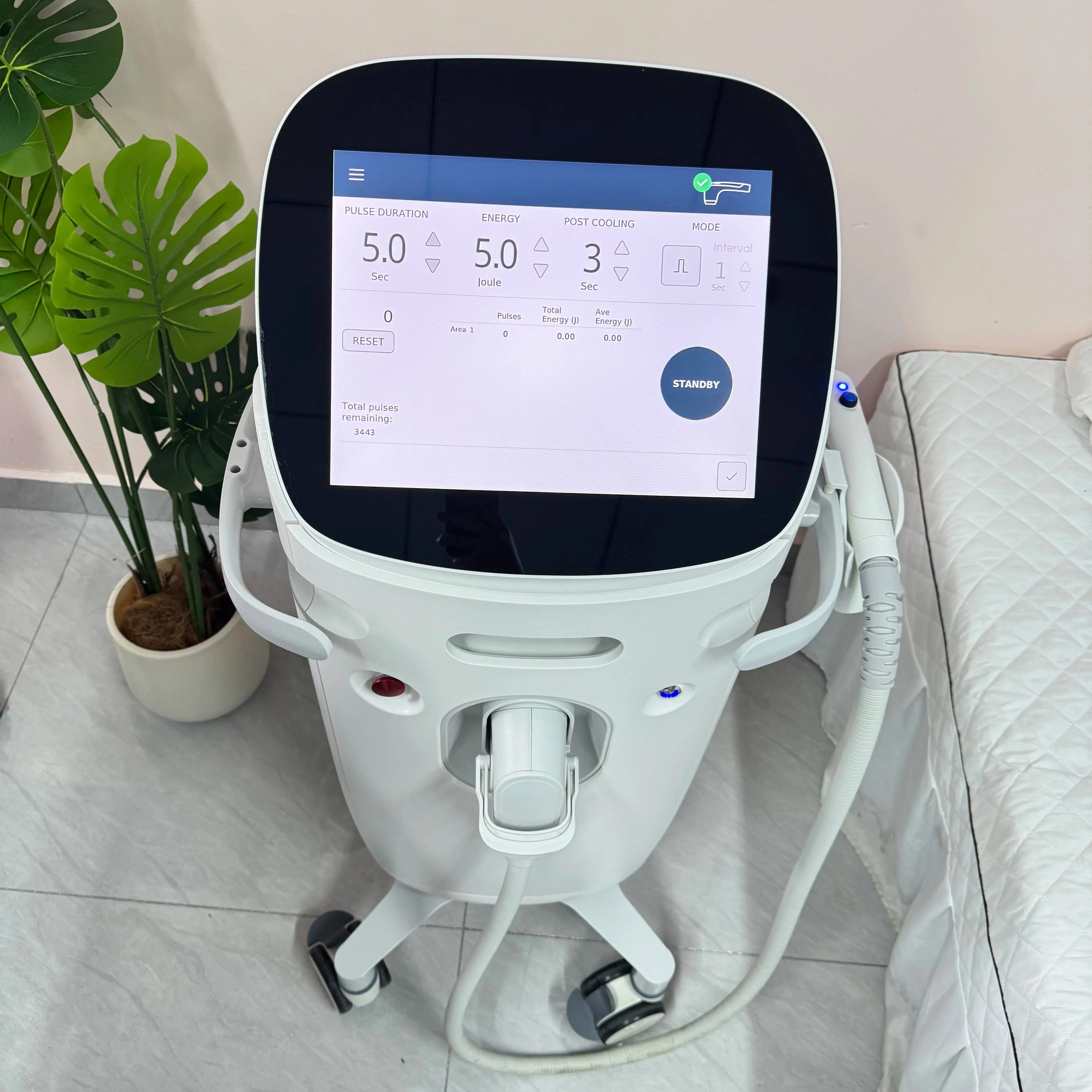 Professional facial lifting and anti-wrinkle beauty machine with touchscreen interface and handheld applicator.