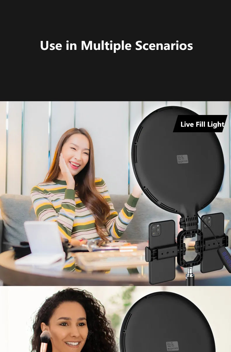 Black circular ring light with two phone mounts on a stand, used for studio lighting and mobile content creation.