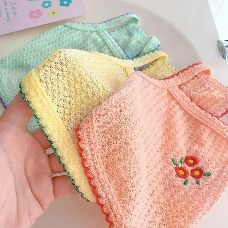 Soft, breathable thin-strap pet tank tops for small dogs and cats in pastel floral colors for summer comfort.