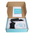 Ionic detox foot spa machine kit with white control unit, black array, power adapter, and manual in a cardboard box.