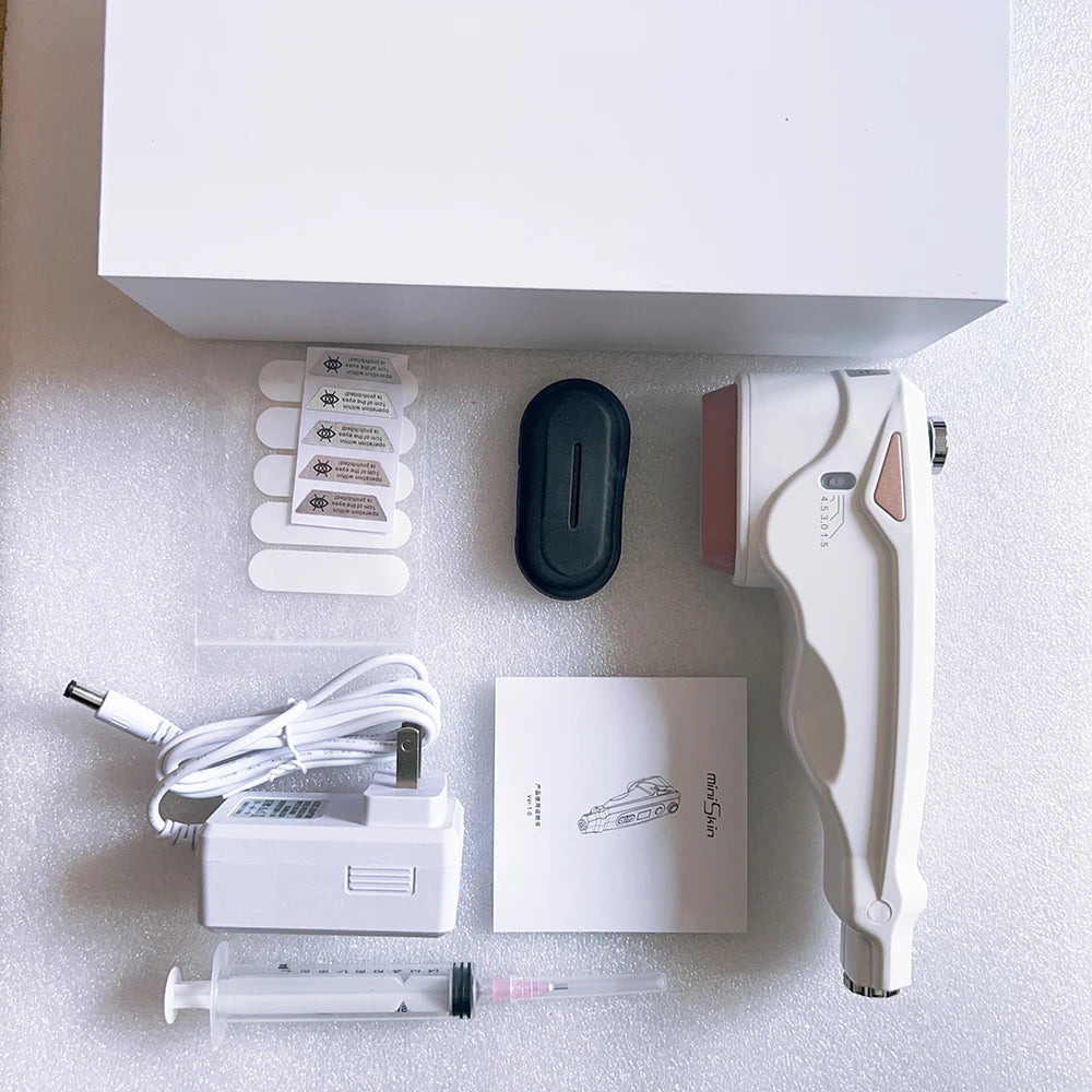 White professional mini HIFU face lifting machine with charger, stickers, and syringe for home anti-aging skincare.