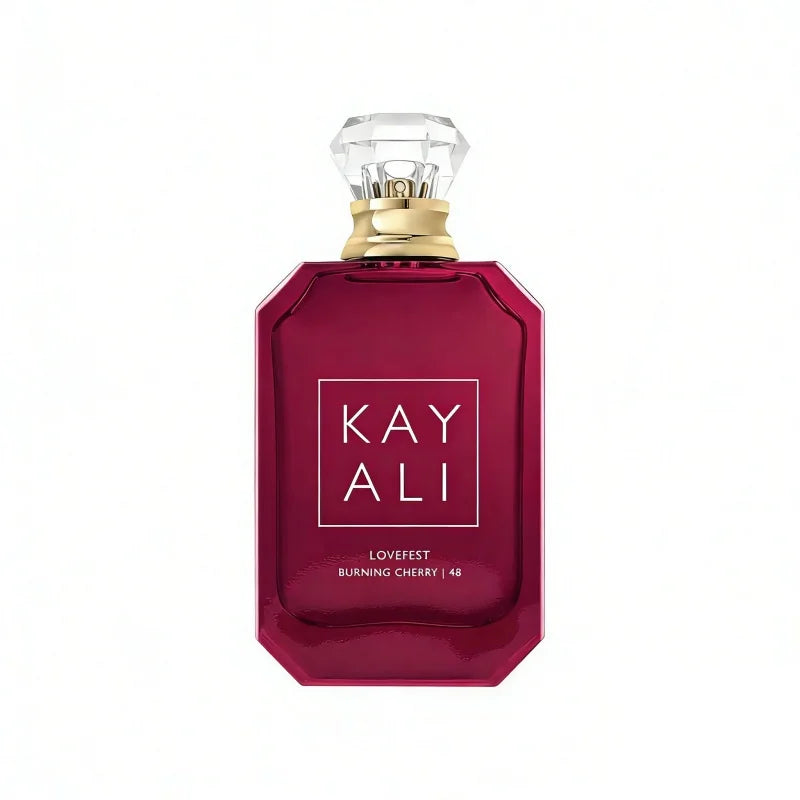 Kayali Lovefest Burning Cherry 48 EDP: Unisex red glass bottle perfume with diamond-cut cap, woody cherry scent, 100ml.