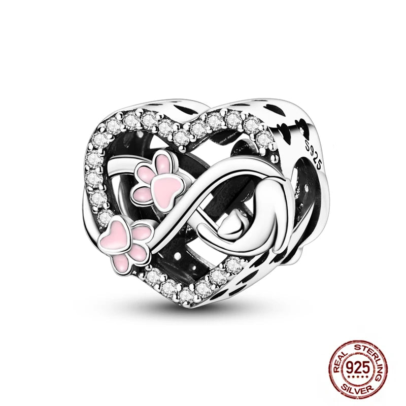 Sterling silver 925 heart charm with pink pet paw prints for DIY charm bracelets. Perfect gift for dog and cat lovers.