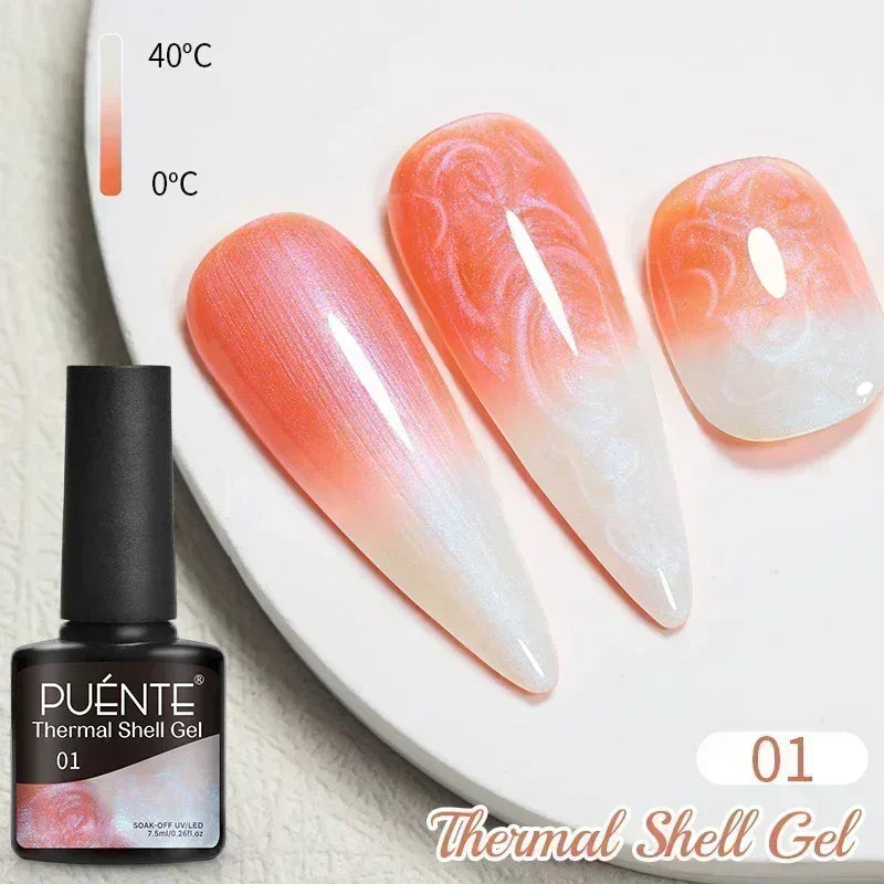 Thermal shell gel polish 01 that changes from orange to white based on temperature, shown on three sample nail tips.