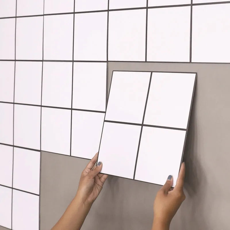 Peel-and-stick square backsplash tiles, smooth white sheet with raised grid lines