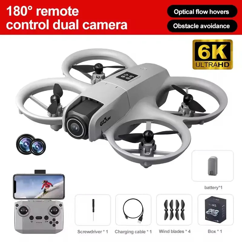 Gray 6K dual-camera drone with propeller guards, remote controller, battery, and accessories for aerial photography.