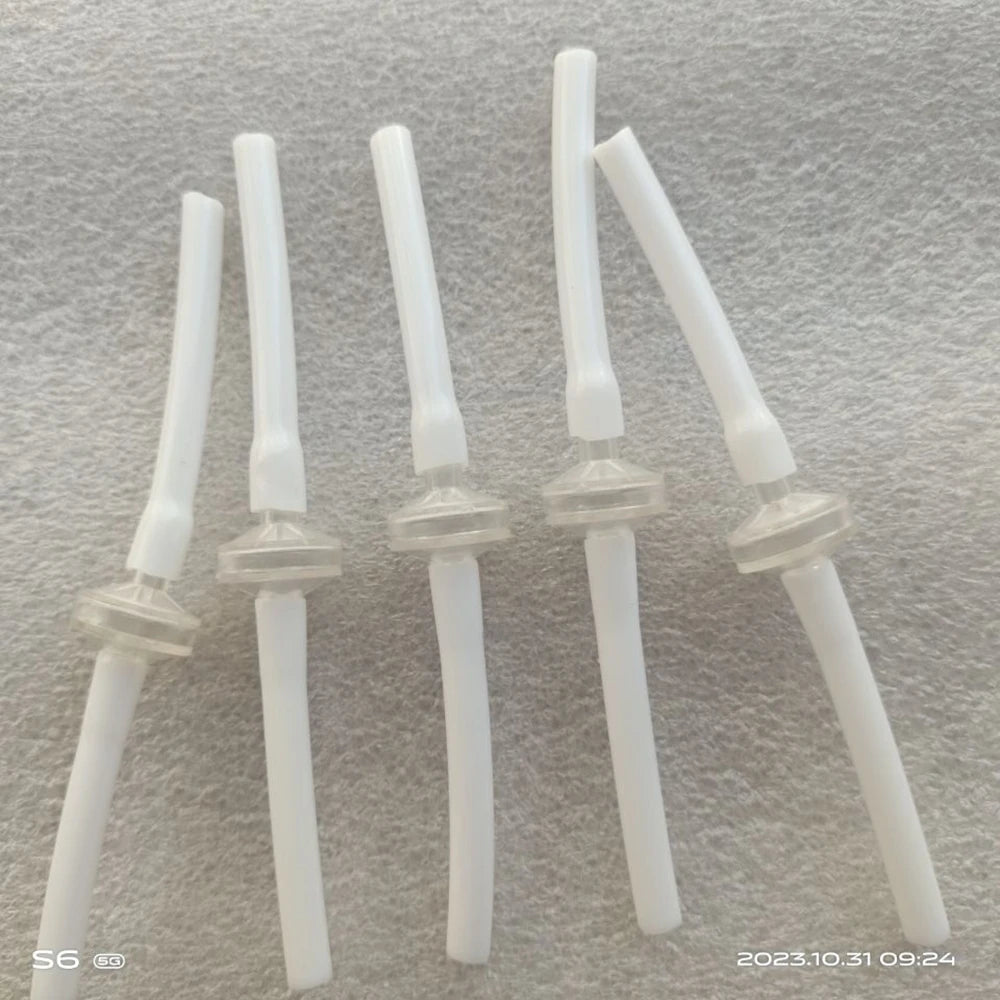 Disposable white replacement tubes with clear filters for Microneedle RF skin lifting and acne scar removal machines.