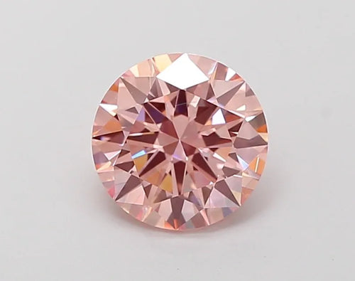 Round brilliant pink gemstone with prismatic facets