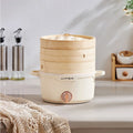 Beige electric bamboo steamer hot pot with stacked bamboo baskets and front power knob