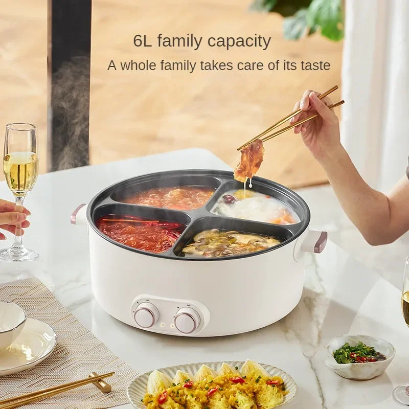 White 4-compartment electric hot pot on marble table with food and two front control knobs