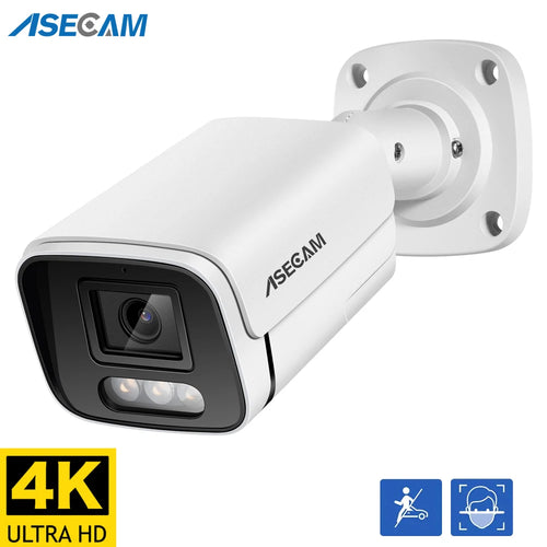 White outdoor bullet CCTV camera with front lens, infrared LEDs, and wall mount